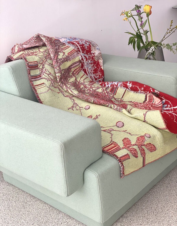 geweven plaid, dubbelzijdig, rood, geelgroen, grote groene fauteuil